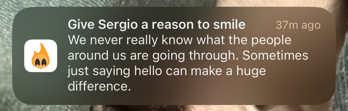 iOS notification from Simmer reading: Give Sergio a reason to smile. We never really know what the people around us are going through. Sometimes just saying hello can make a huge difference.